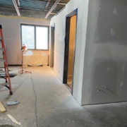 The sheetrock on the new storage closet and restroom has been mudded and sanded.