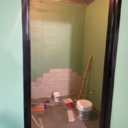 Bathroom tile is being installed in the new Preschool restroom