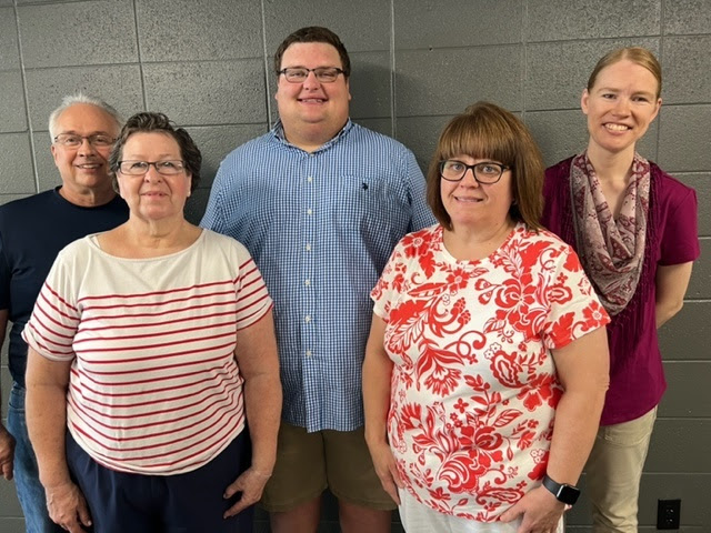 First Mennonite Church staff - Kevin and Carolyn Miller, Custodians; Luke Unruh, Pastor; and Laura Goerzen, Pastor; Tracy Kerr, Administrative Assistant